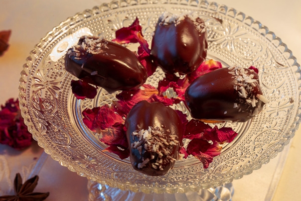 Dates with marzipan filling in dark chocolate