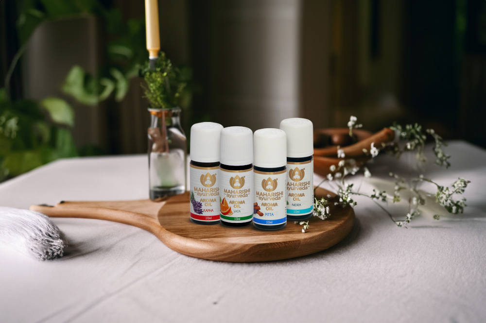 Aroma oils on a spoon Aroma oils on a wooden spoon